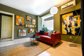 The red couch at Universitate - Homey Residence